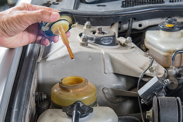 What Causes Power Steering Fluid to Leak? | B & L Automotive